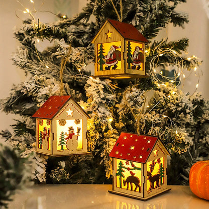 Casa iluminada pequeña de Navidad, colgante de madera.